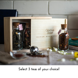 Rustic Pinewood Box with Glass Bottles